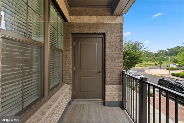 a view of a large building from a balcony