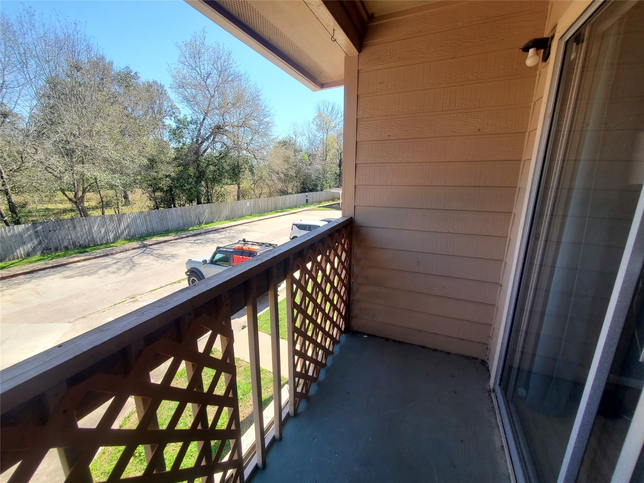 1505 Ward Road, Unit 218 Baytown, TX 77520 - Photo 13 of 17 a view of balcony with wooden floor