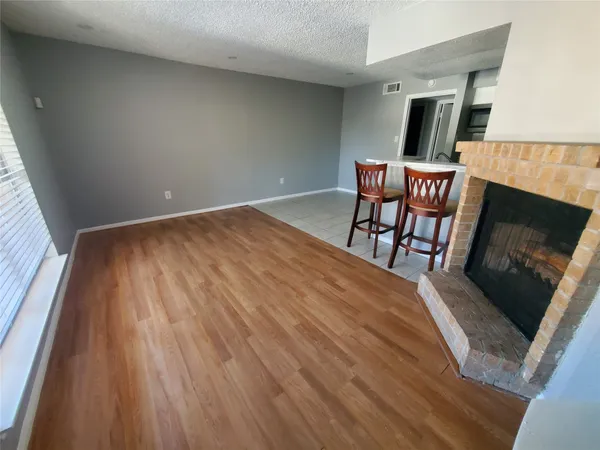 a close view of a stove and microwave in a kitchen