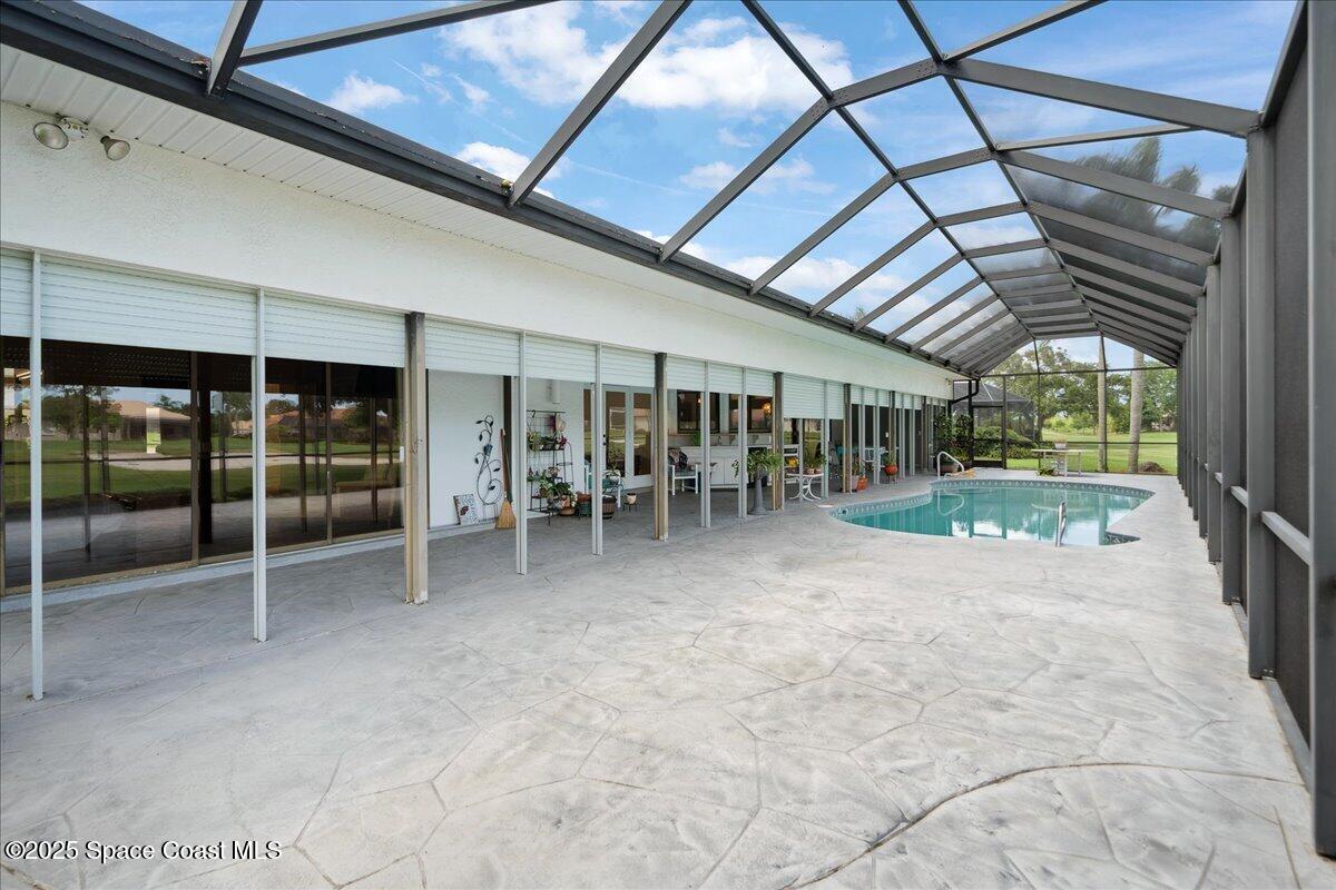 649 Spring Lake Drive Melbourne, FL 32940 - Photo 32 of 47 a view of a porch with furniture