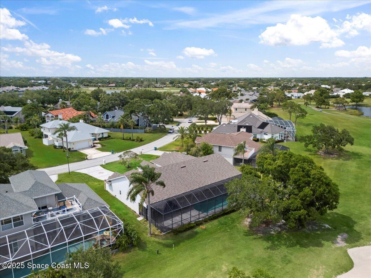 649 Spring Lake Drive Melbourne, FL 32940 - Photo 42 of 47 an aerial view of a house with a garden