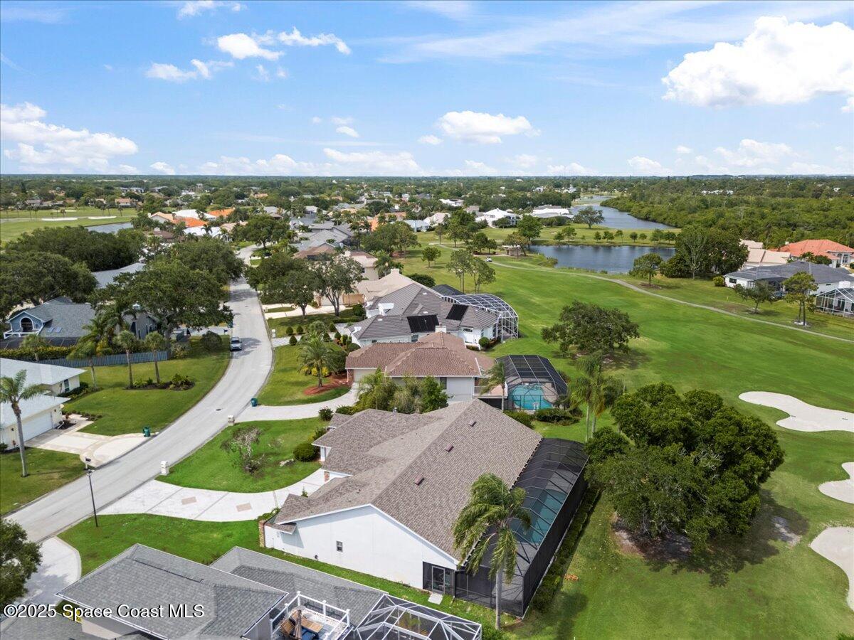 649 Spring Lake Drive Melbourne, FL 32940 - Photo 43 of 47 an aerial view of residential houses with outdoor space and river
