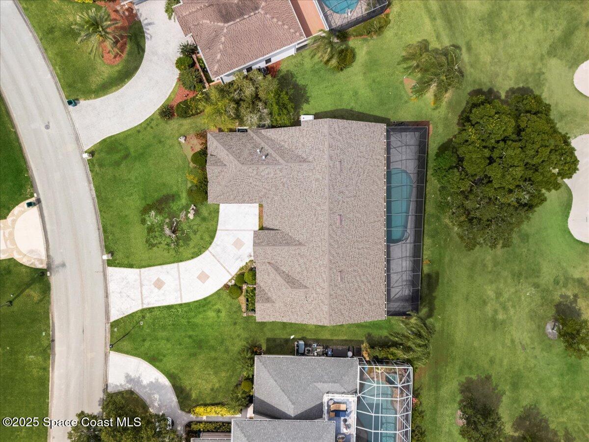 649 Spring Lake Drive Melbourne, FL 32940 - Photo 46 of 47 an aerial view of a swimming pool