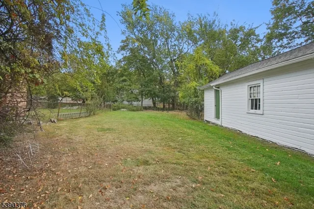 a view of a backyard with a garden