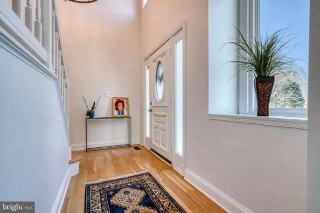 a view of a dining room with furniture and window