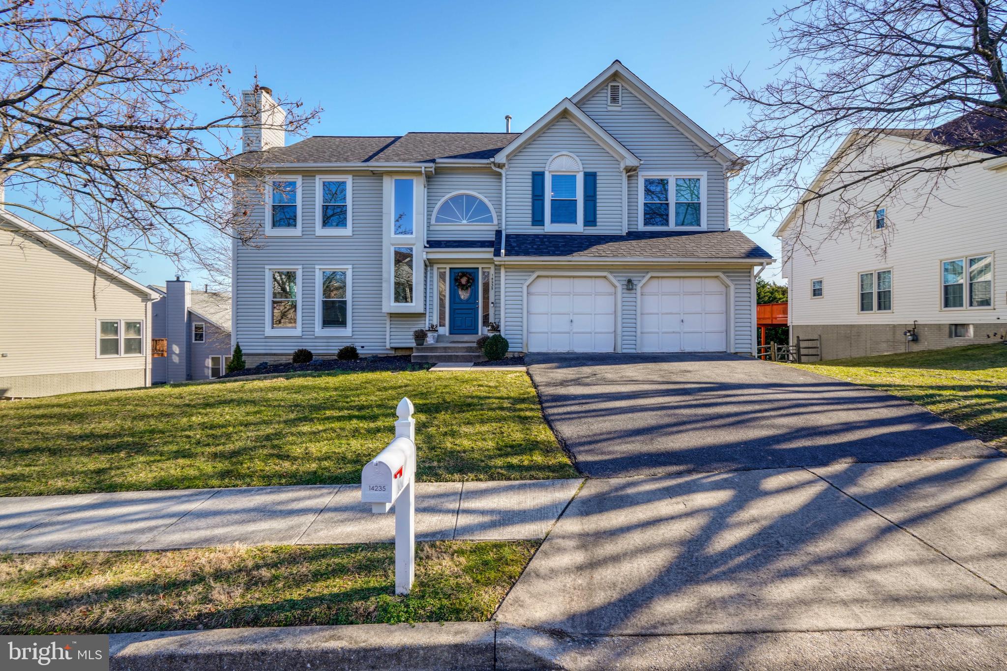 14235 Masterpiece Lane North Potomac, MD 20878 - Photo 2 of 66 a front view of a house with a yard