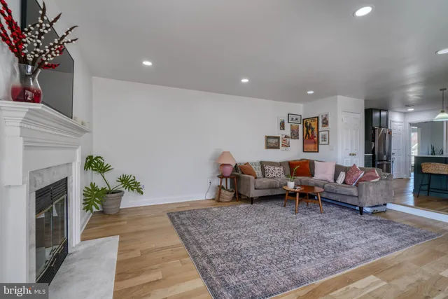 a room with mirror and furniture