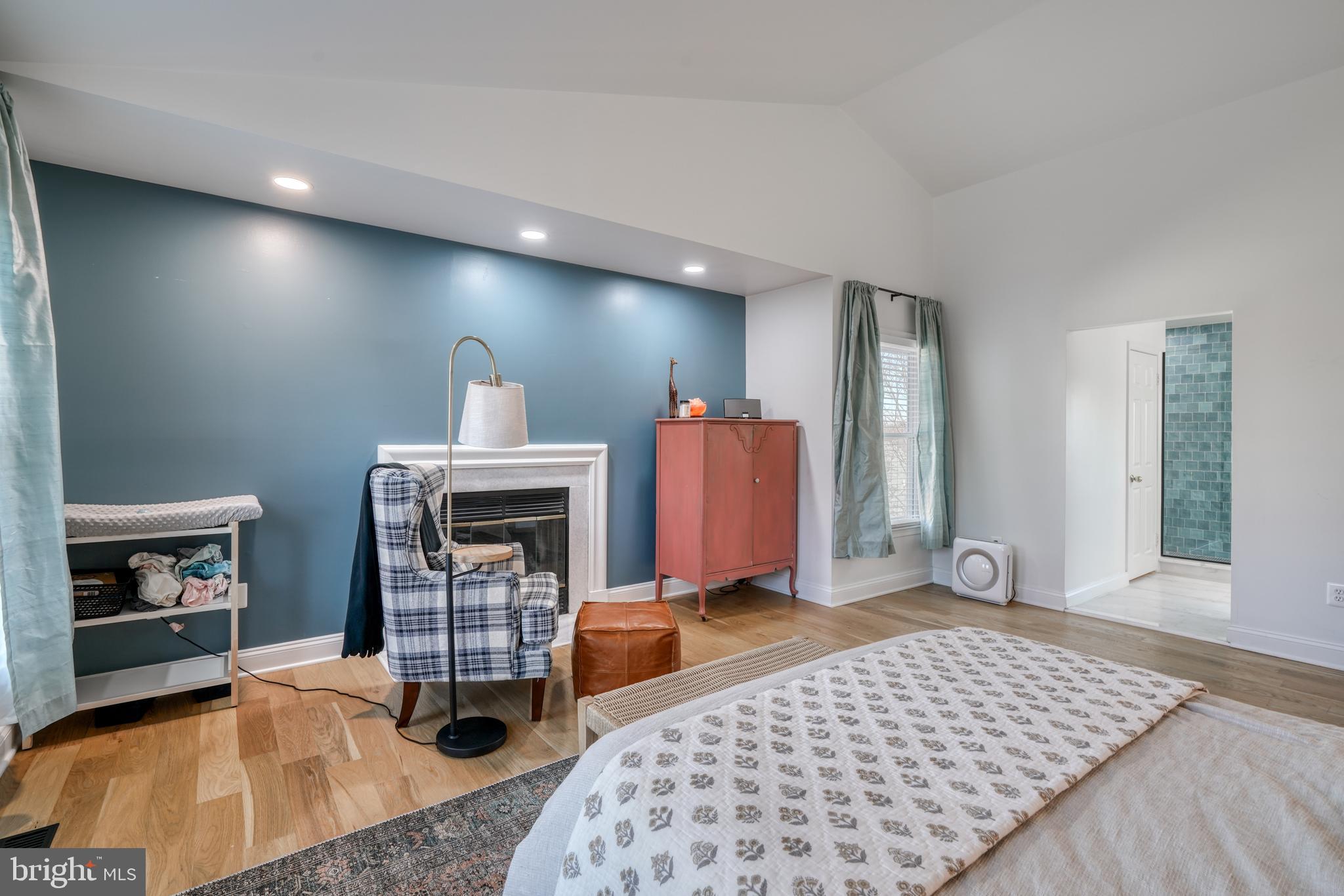 14235 Masterpiece Lane North Potomac, MD 20878 - Photo 39 of 66 a bedroom with a bed and a fireplace