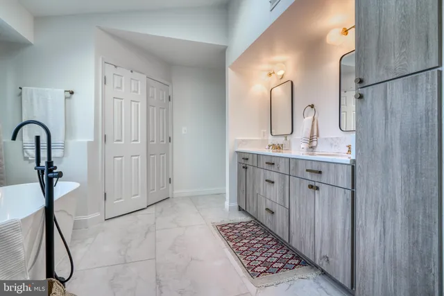 a view of room with window and wooden floor