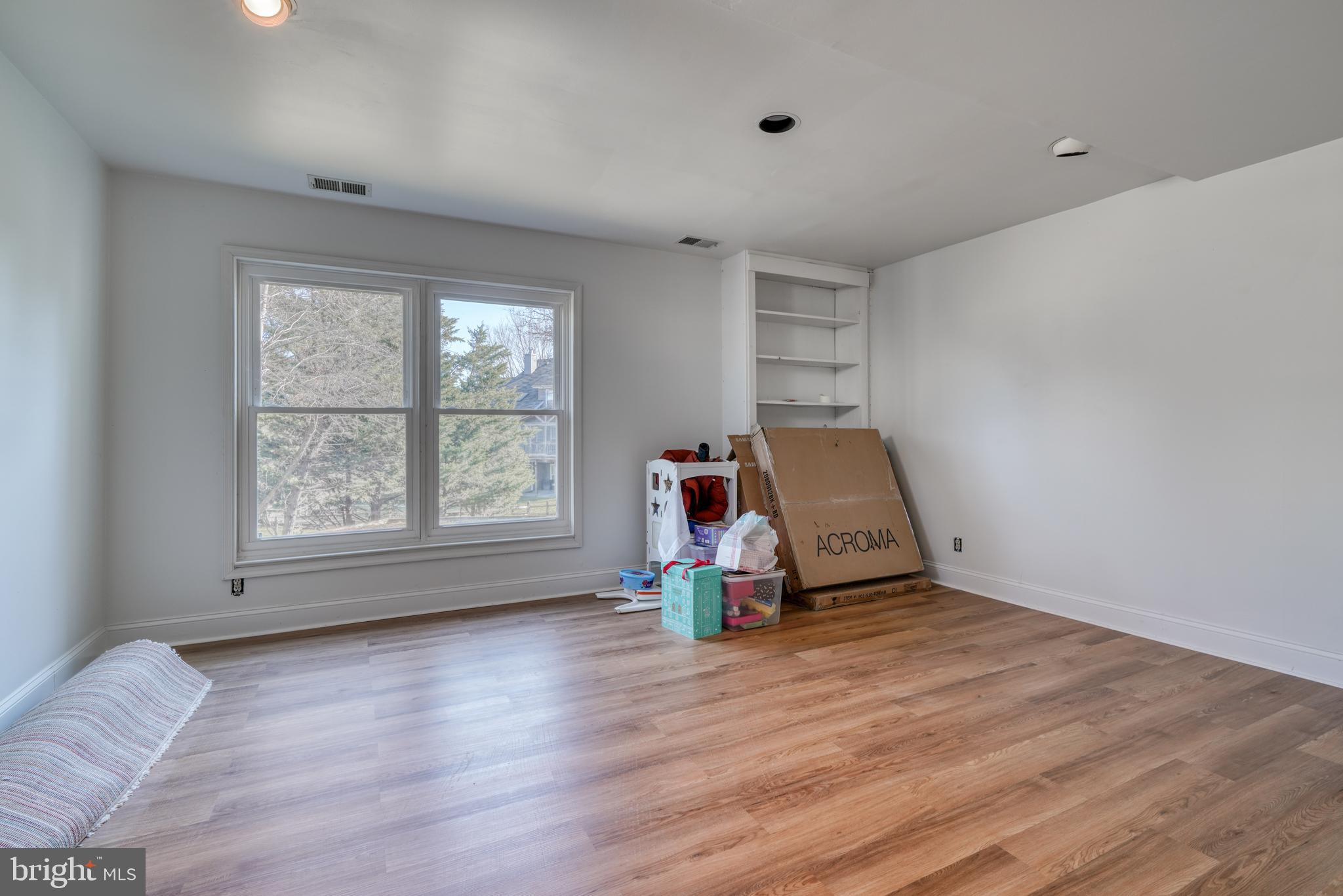 14235 Masterpiece Lane North Potomac, MD 20878 - Photo 52 of 66 a view of room with window and wooden floor
