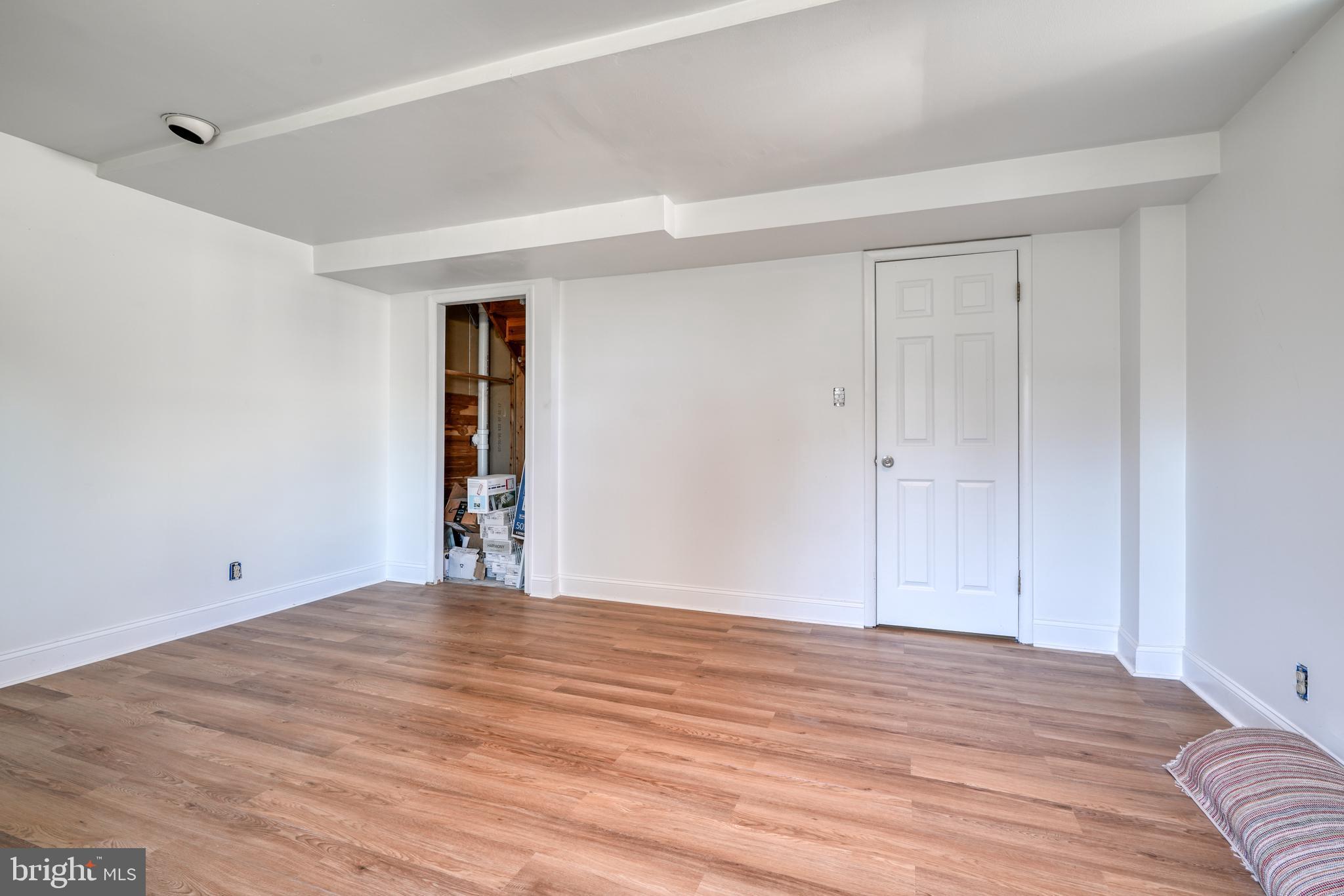 14235 Masterpiece Lane North Potomac, MD 20878 - Photo 53 of 66 a view of empty room with wooden floor