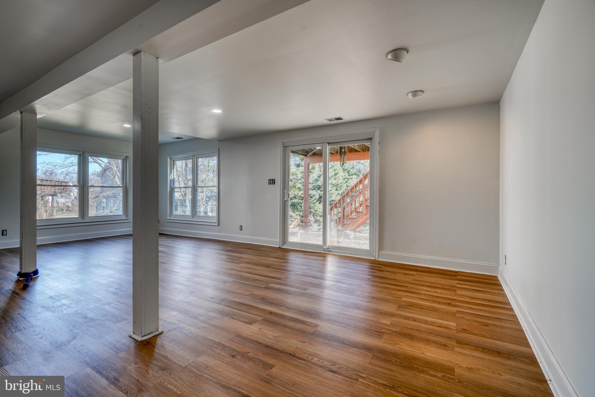 14235 Masterpiece Lane North Potomac, MD 20878 - Photo 56 of 66 wooden floor in an empty room with a window
