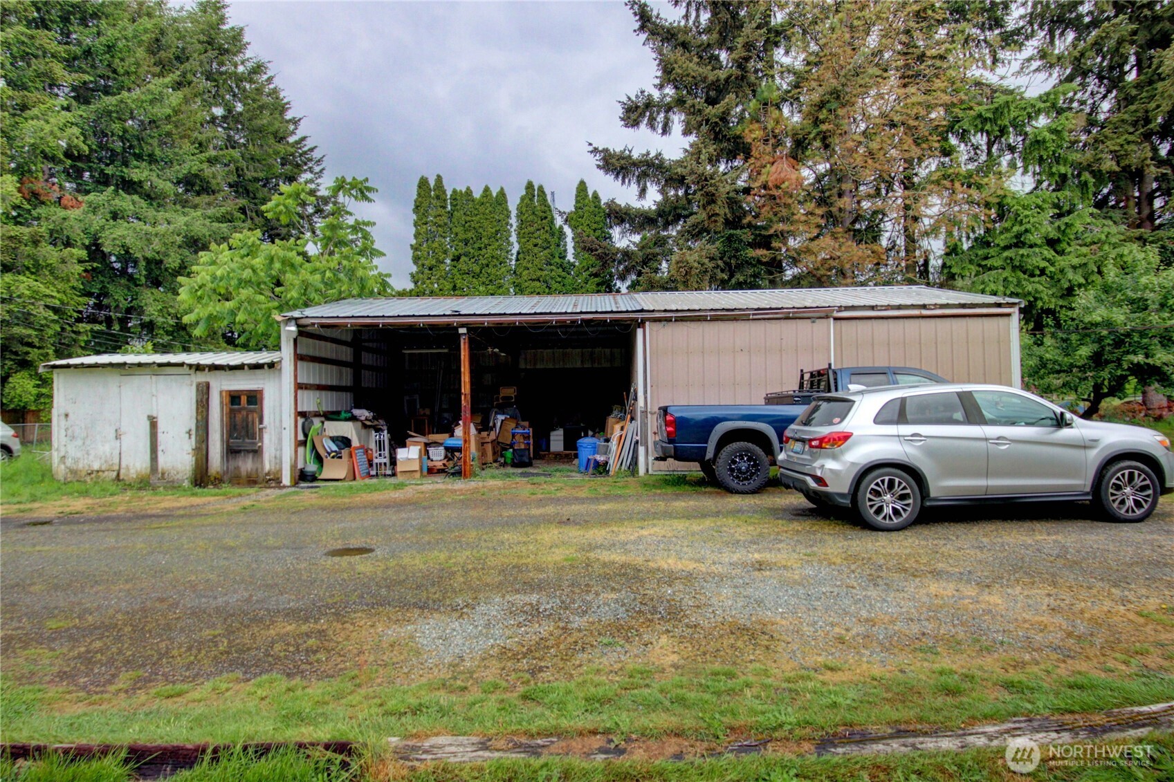 7185 Old Highway 99 North Road Burlington, WA 98233 - Photo 2 of 26 a view of a car in front of house