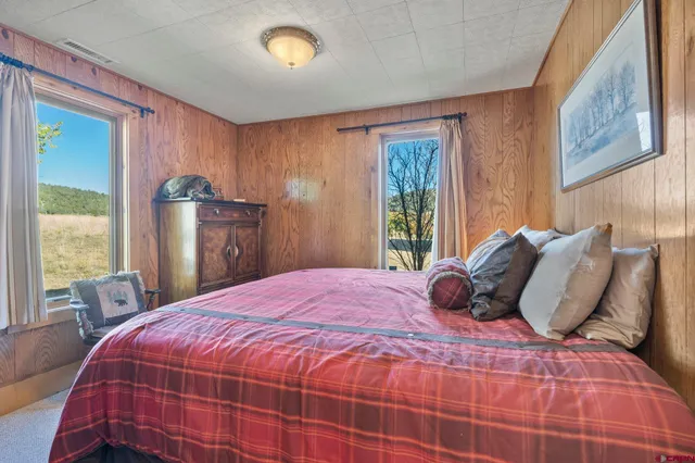 a bathroom with a toilet a sink and shower