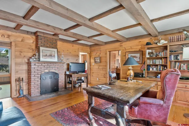 a room with furniture and wooden floor