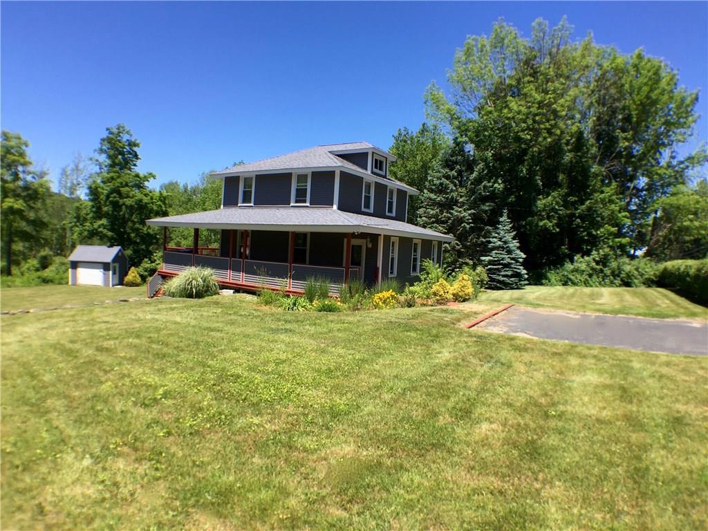 Front/side entry, wrap around porch.