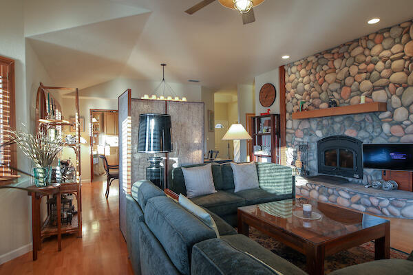 1050 Spring Road Shelter Cove, CA 95589 - Photo 13 of 42 a living room with furniture and a fireplace