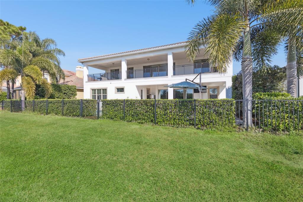 13436 Heswall Run Orlando, FL 32832 - Photo 40 of 72 a view of a house with a yard