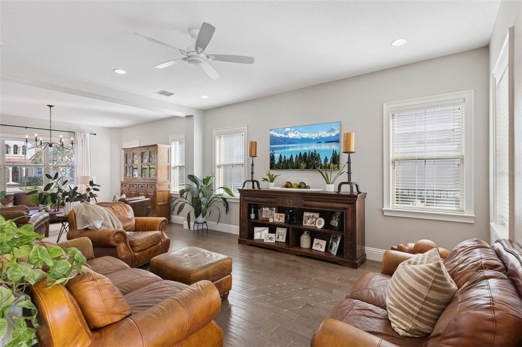 13436 Heswall Run Orlando, FL 32832 - Photo 5 of 72 a living room with furniture and a fireplace