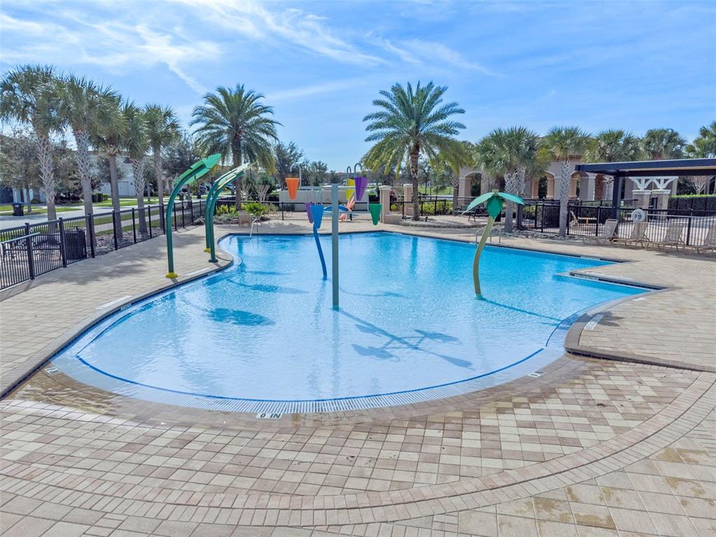 13436 Heswall Run Orlando, FL 32832 - Photo 60 of 72 swimming pool view with a garden space