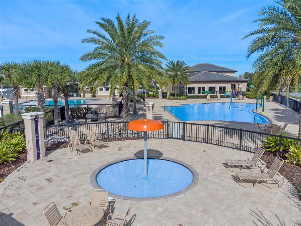 13436 Heswall Run Orlando, FL 32832 - Photo 61 of 72 a swimming pool with outdoor seating yard and barbeque oven