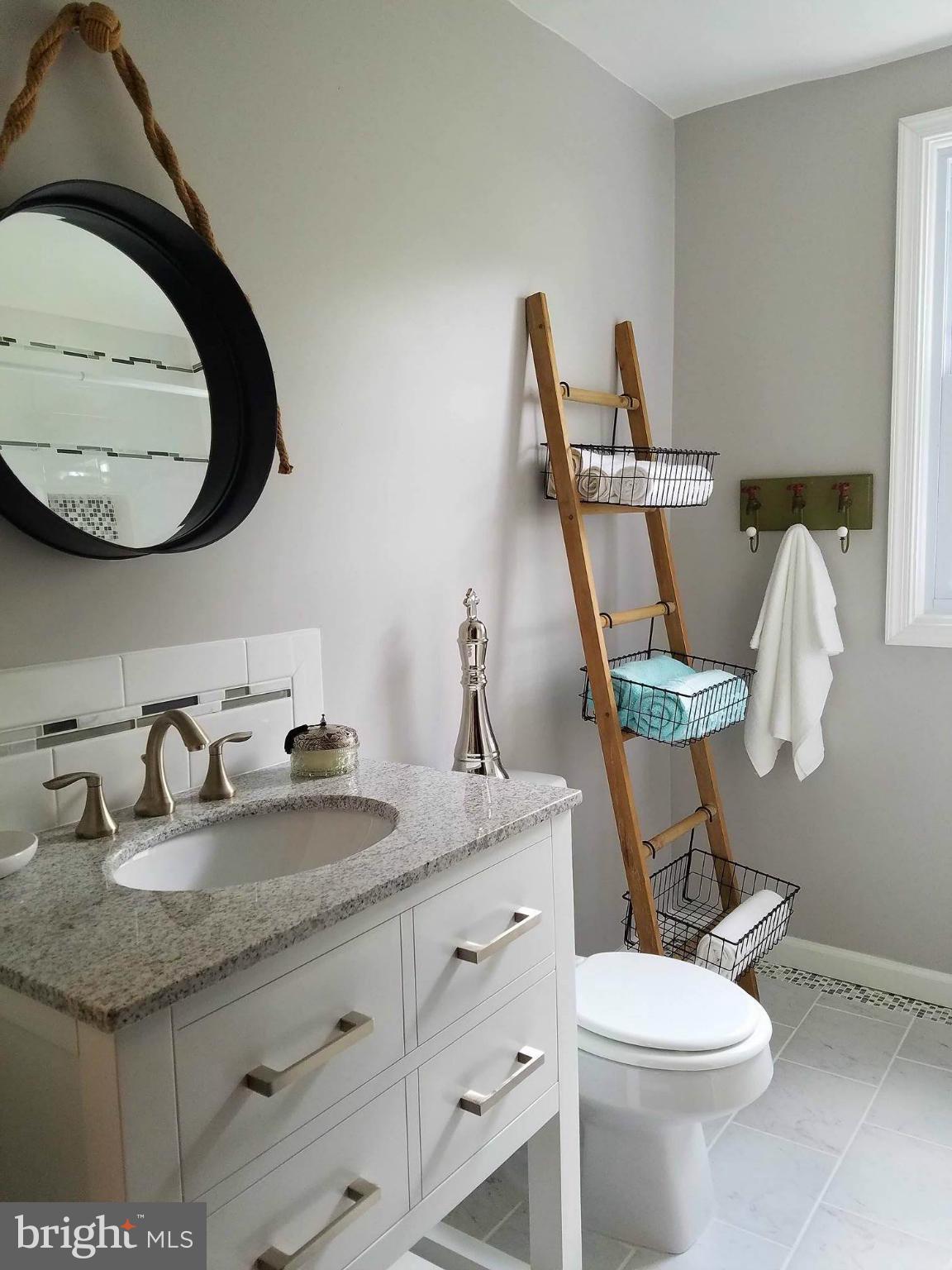 8212 Oakleigh Road Baltimore, MD 21234 - Photo 11 of 30 1st Floor Full Bath w/ custom Vanity