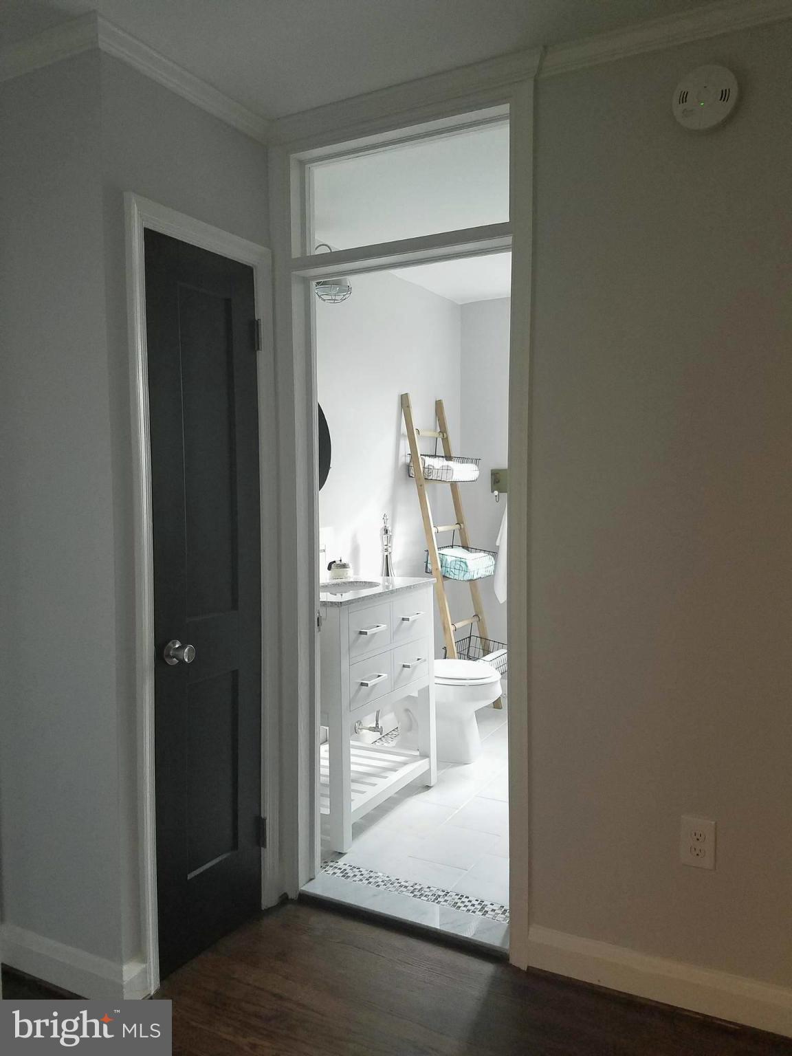 8212 Oakleigh Road Baltimore, MD 21234 - Photo 10 of 30 1st Floor Full Bath w/ Transom