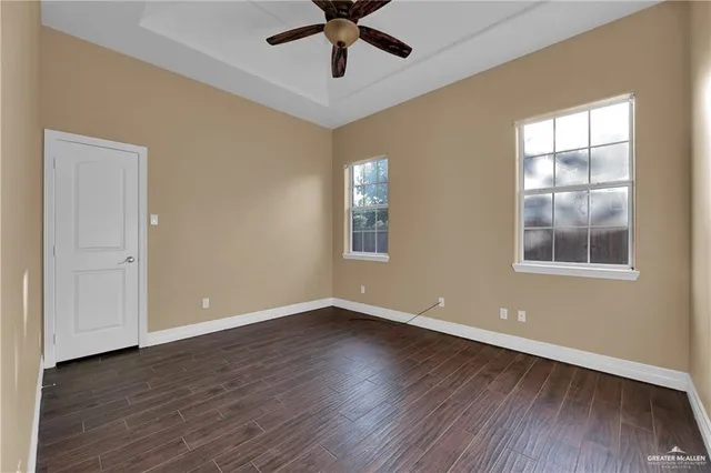 a bathroom with a sink vanity and a mirror