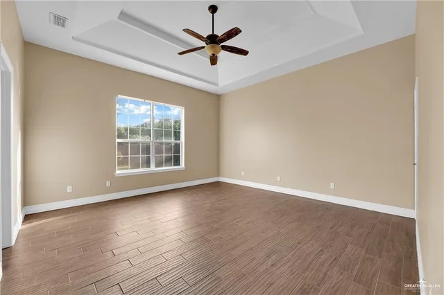 a bathroom with a sink vanity and a mirror