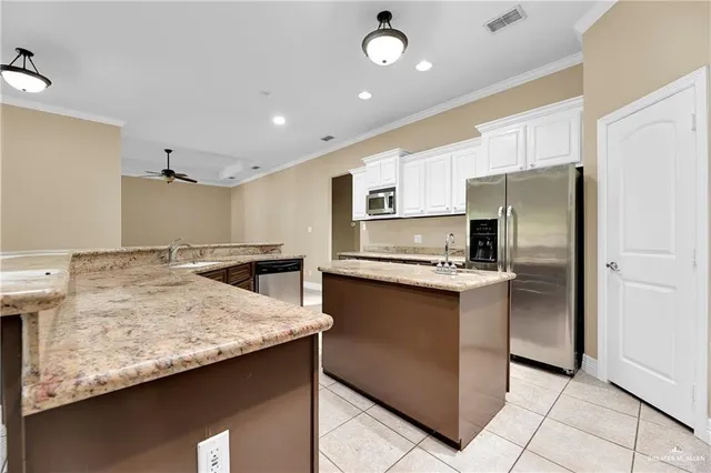 a view of a house with backyard and porch