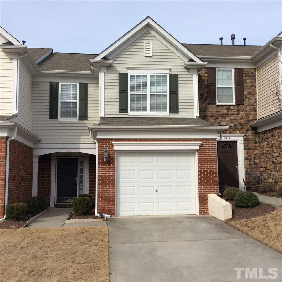 8706 Owl Roost Place Raleigh, NC 27617 - Photo 1 of 7 a front view of a house with a garage