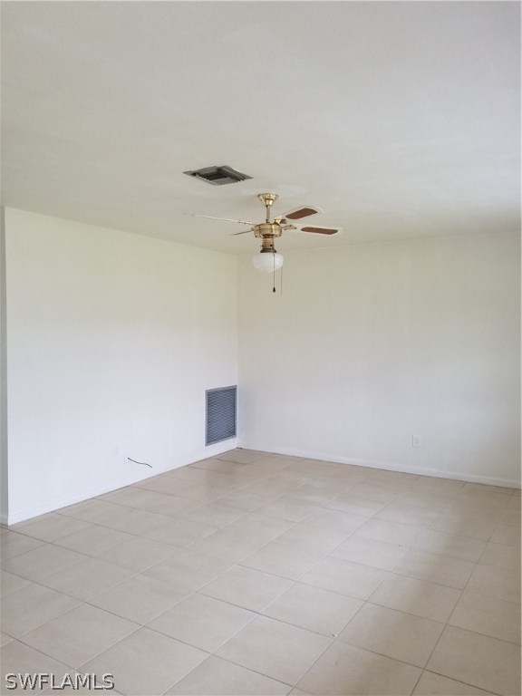 102 Texas Road Lehigh Acres, FL 33936 - Photo 3 of 6 wooden floor in a bathroom
