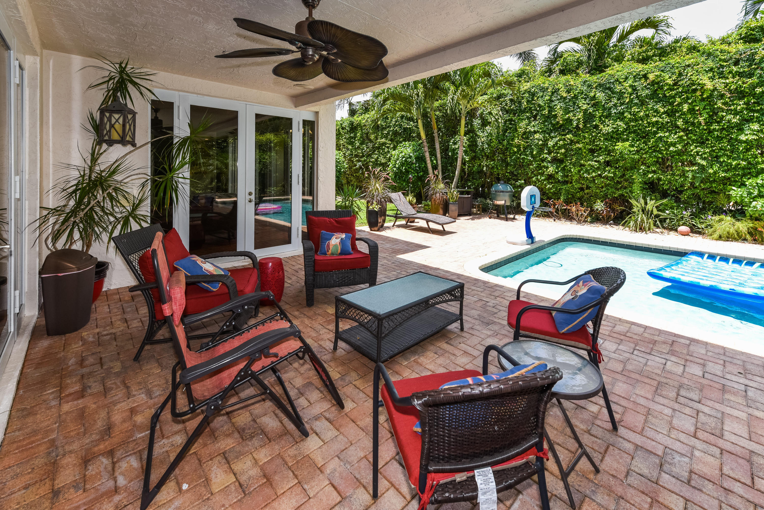 5855 Paddington Way Boca Raton, FL 33496 - Photo 40 of 40 a building outdoor space with patio furniture