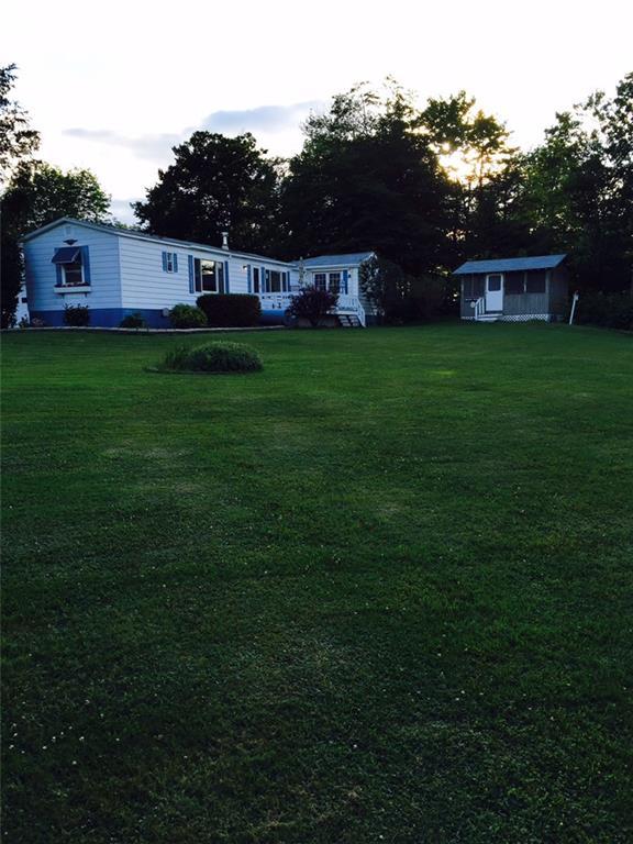 1235 Dexter Road Dover-Foxcroft, ME 04426 - Photo 22 of 26 Side view with side deck and...