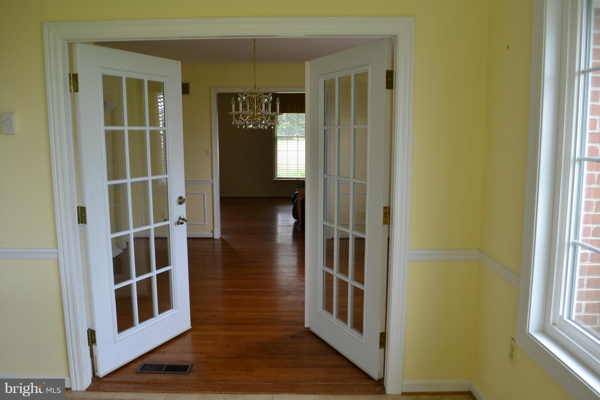 24878 Swan Road St. Michaels, MD 21663 - Photo 11 of 30 French doors from sun room to dining room