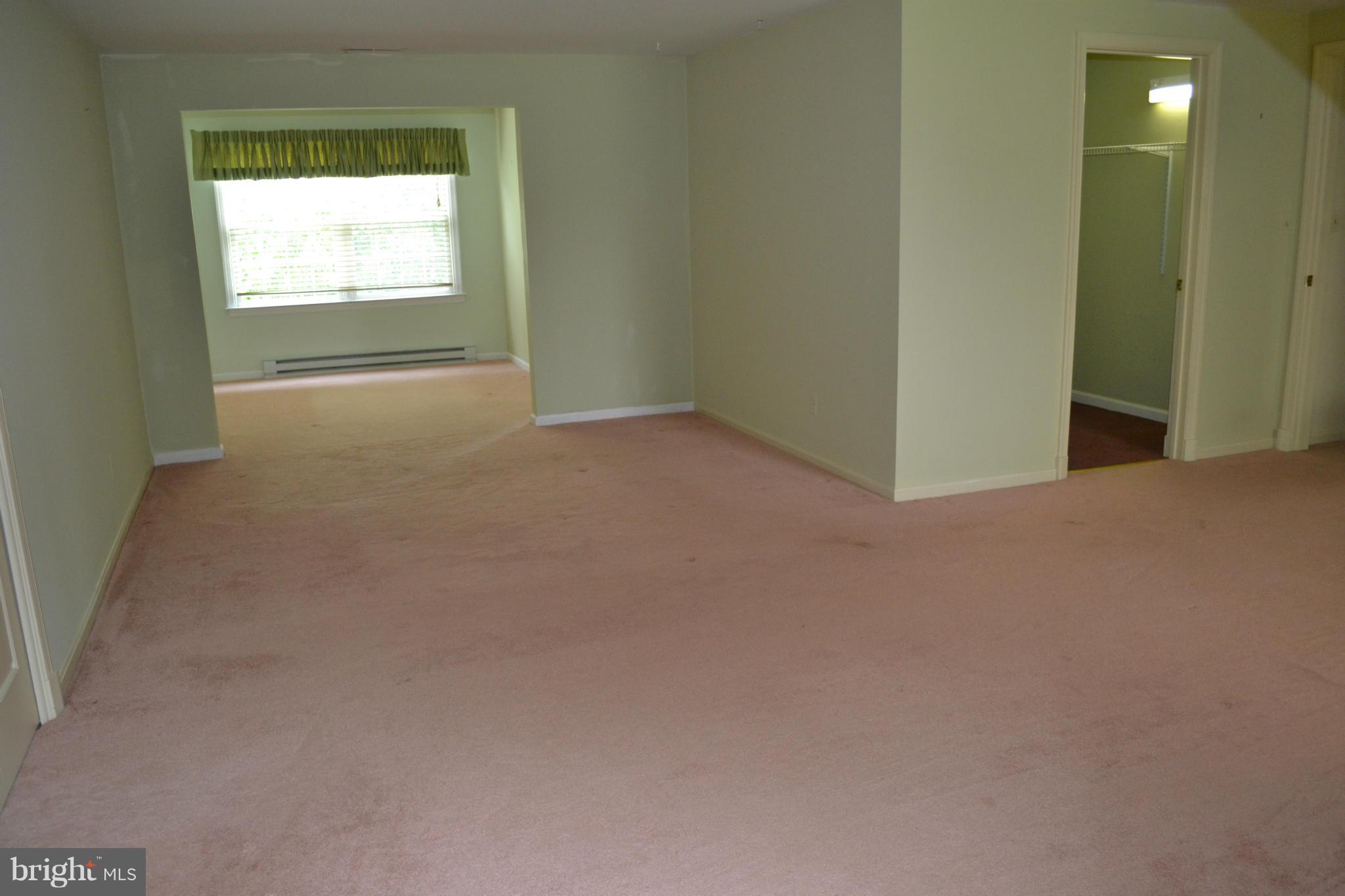 24878 Swan Road St. Michaels, MD 21663 - Photo 17 of 30 Master bedroom 1 with sitting area and walk-in