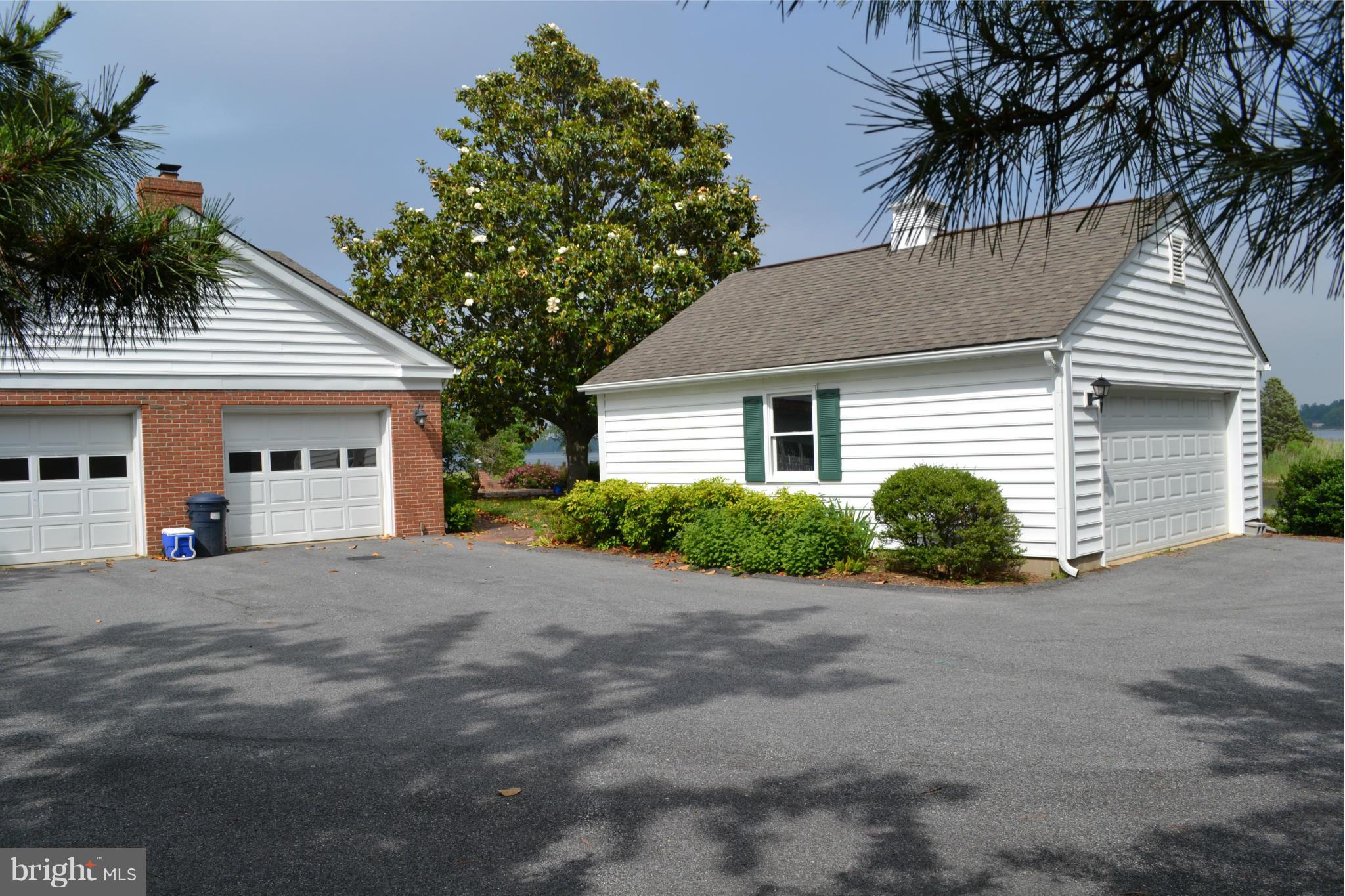 24878 Swan Road St. Michaels, MD 21663 - Photo 27 of 30 Attached 2-car garage separate Boat shed