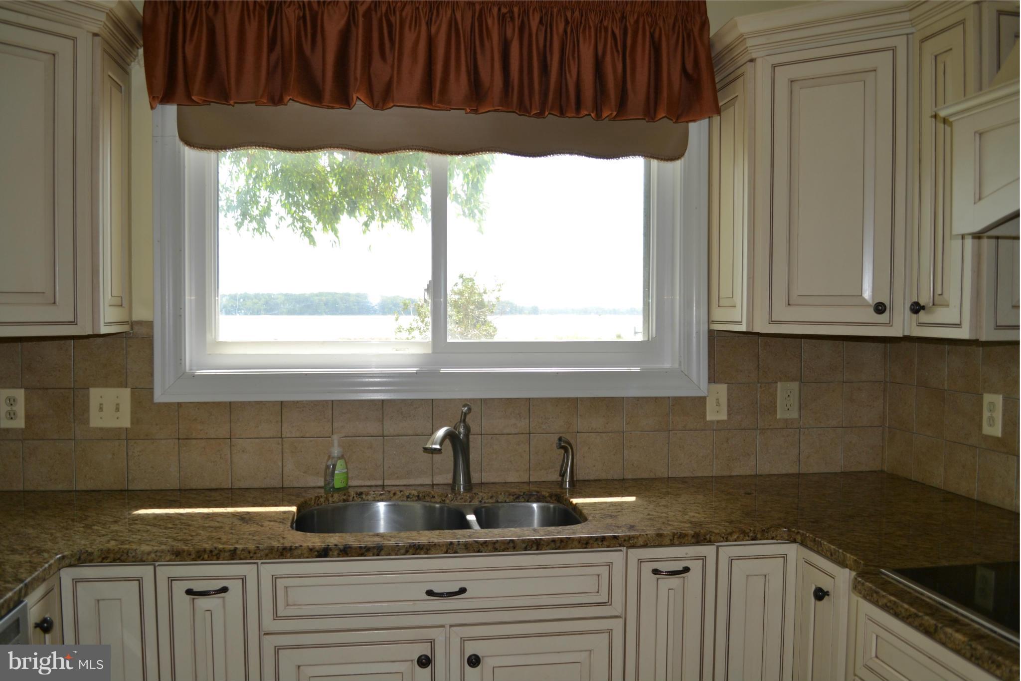 24878 Swan Road St. Michaels, MD 21663 - Photo 9 of 30 Enjoy the view from the kitchen window