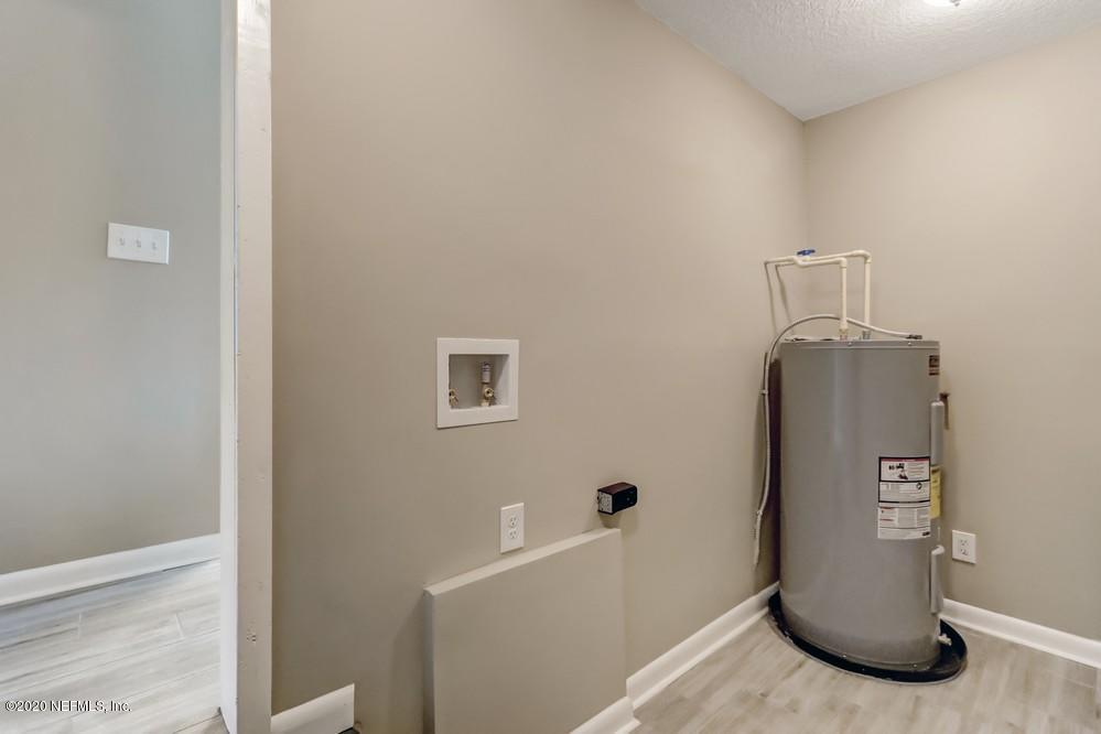 117 Hercules Road St. Augustine, FL 32086 - Photo 20 of 26 a view of an empty room with a window