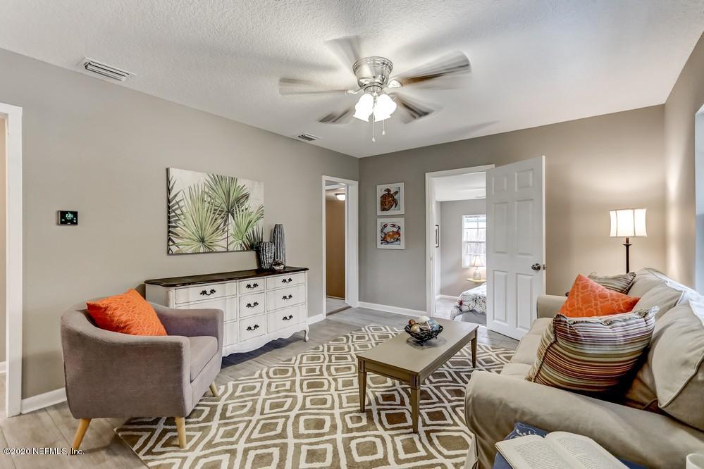 117 Hercules Road St. Augustine, FL 32086 - Photo 3 of 26 a living room with furniture and wooden floor