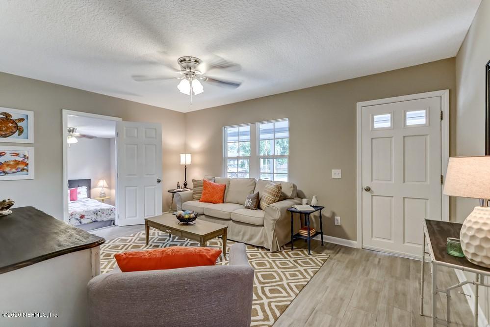117 Hercules Road St. Augustine, FL 32086 - Photo 8 of 26 a living room with furniture and a window