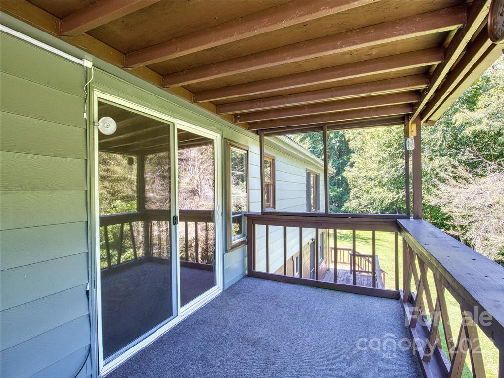 5474 Soco Road Maggie Valley, NC 28751 - Photo 14 of 48 a view of an empty room with a large window
