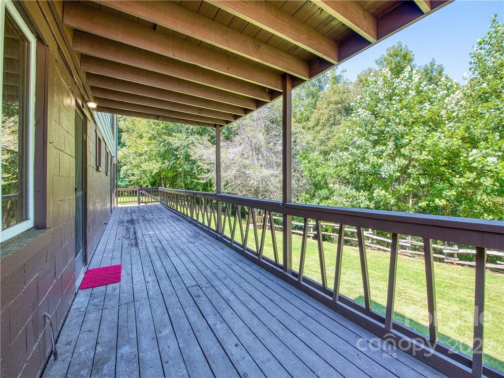 5474 Soco Road Maggie Valley, NC 28751 - Photo 23 of 48 a view of porch with wooden floor