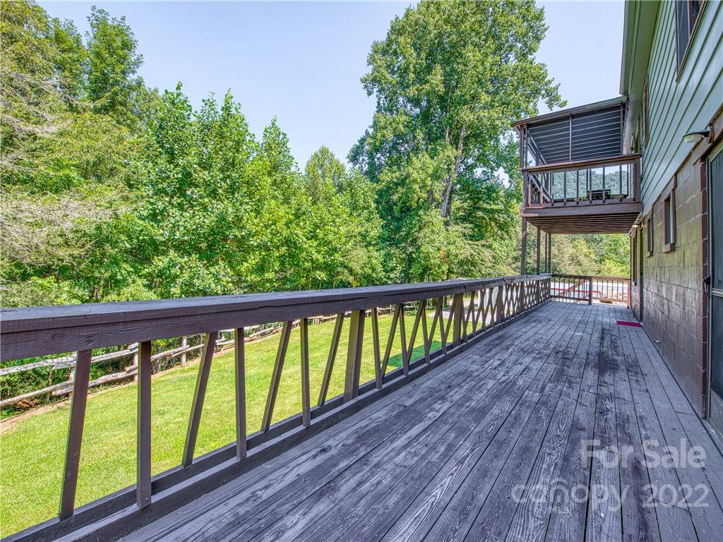5474 Soco Road Maggie Valley, NC 28751 - Photo 24 of 48 a view of balcony with wooden floor and fence