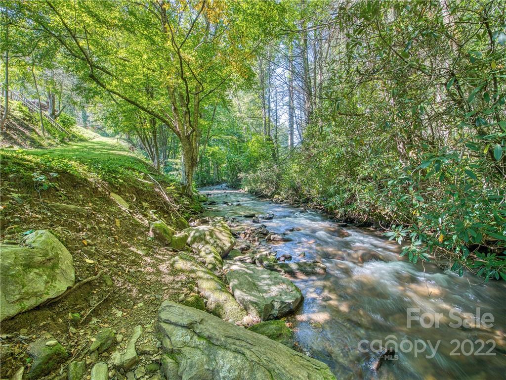 5474 Soco Road Maggie Valley, NC 28751 - Photo 35 of 48 a big yard with lots of green space