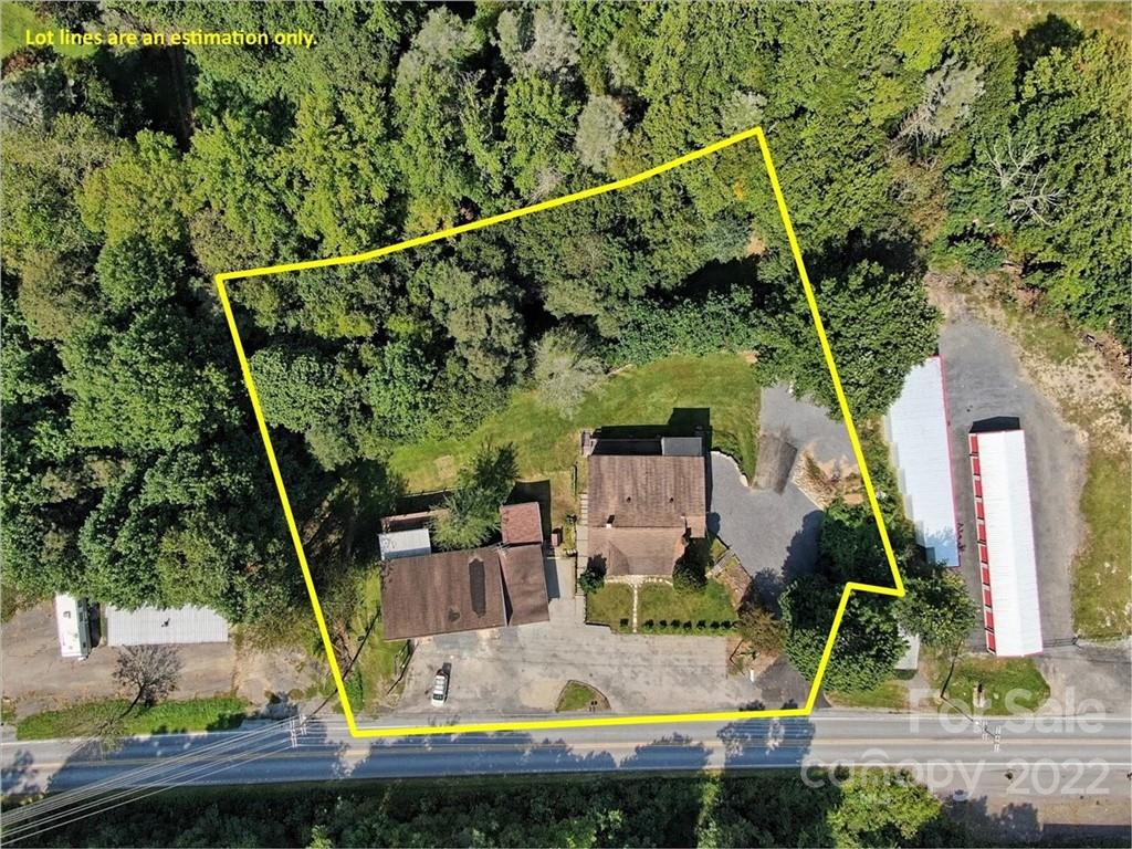 5474 Soco Road Maggie Valley, NC 28751 - Photo 4 of 48 an aerial view of a house with swimming pool