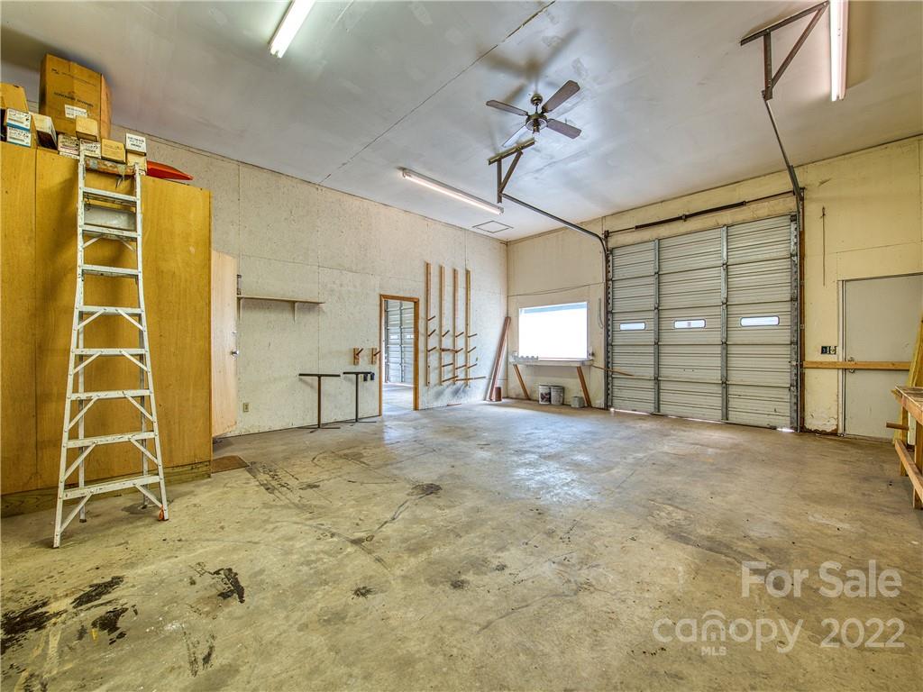 5474 Soco Road Maggie Valley, NC 28751 - Photo 46 of 48 a view of a room with gym equipment and a window