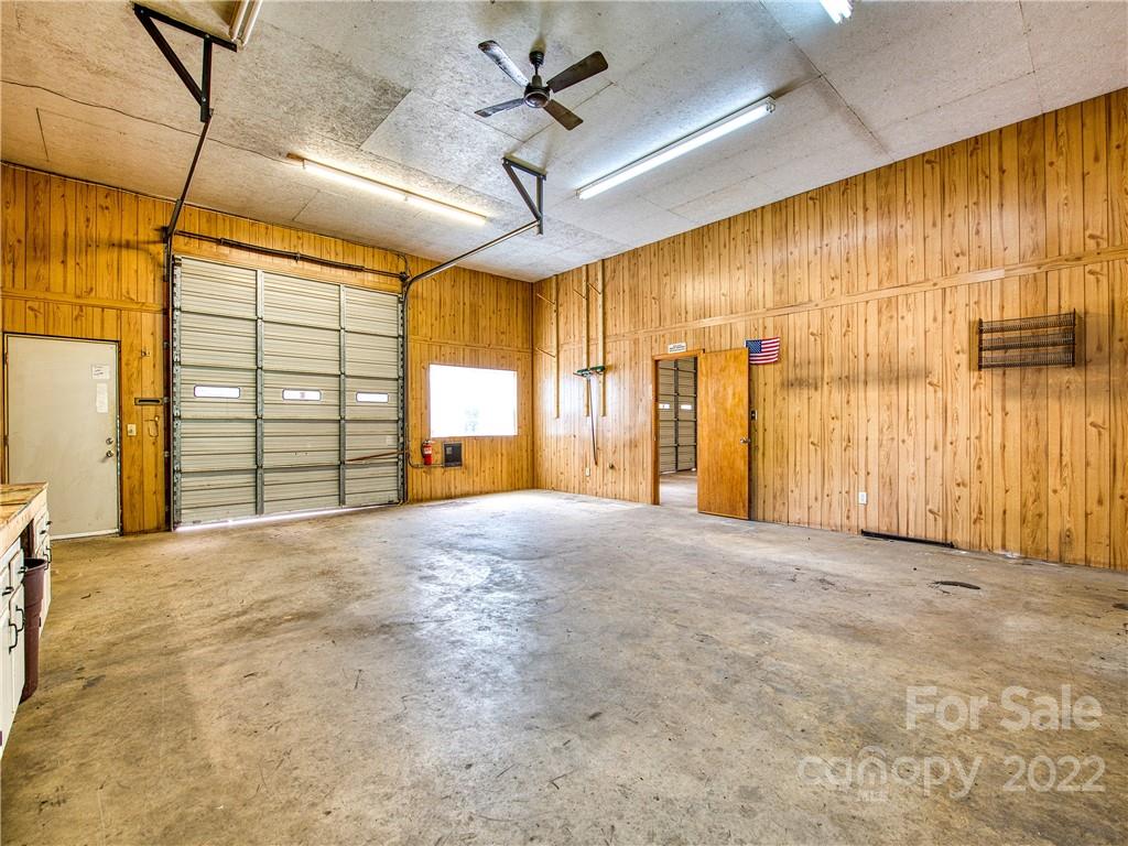 5474 Soco Road Maggie Valley, NC 28751 - Photo 48 of 48 a view of livingroom with a ceiling fan and window