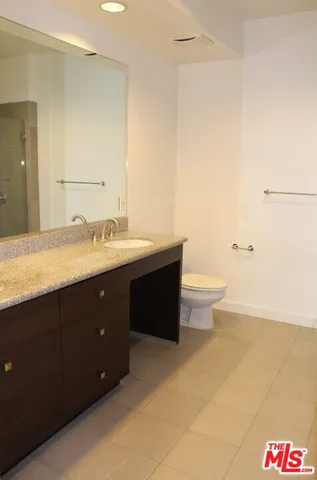 a bathroom with a shower and a bathtub