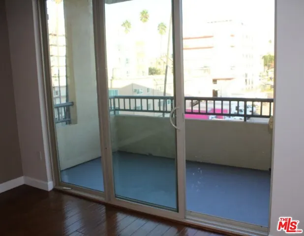 a view of a balcony with an outdoor space